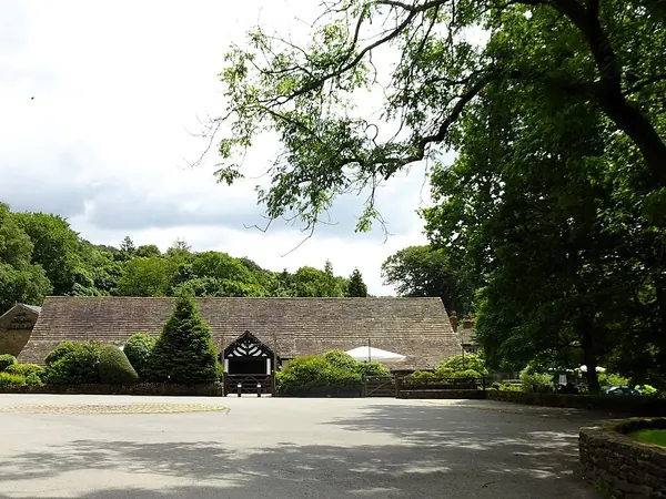 Rivington Hall Barn among the trees of Lever Park near Horwich