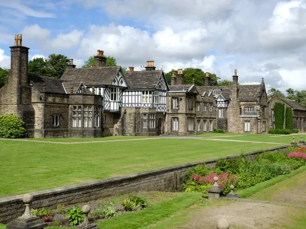 Smithills Hall, a stone and timber-framed manor house with gardens in Bolton