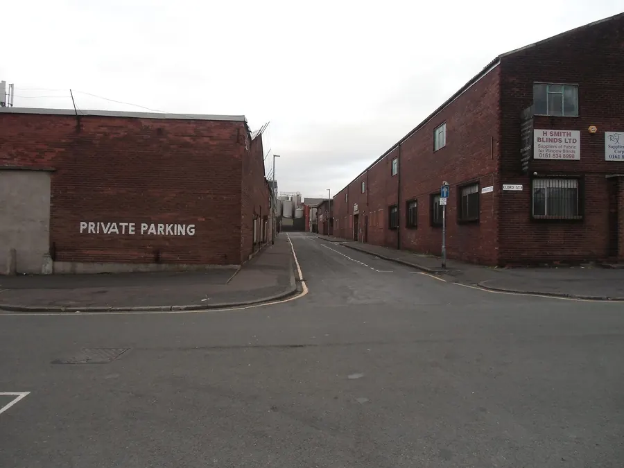 Brick wholesale warehouses and loading doors on a side street in Strangeways, Cheetham
