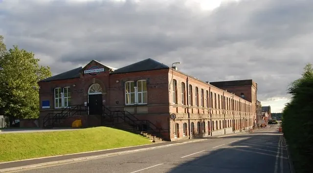 Rivington House and the long brick railway workshops of the former Horwich Loco Works