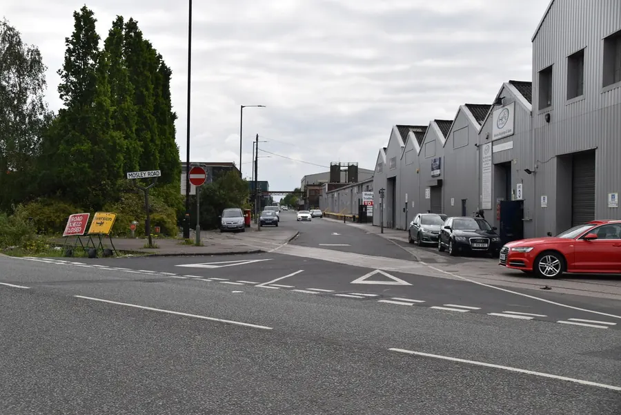 Row of pitched-roof industrial units along Mosley Road, Trafford Park